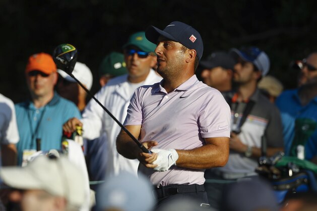 Francesco Molinari, of Italy, watches his drive on the 18th hole during the third round for the Masters golf tournament Saturday, April 13, 2019, in Augusta, Ga. (AP Photo/Matt Slocum)