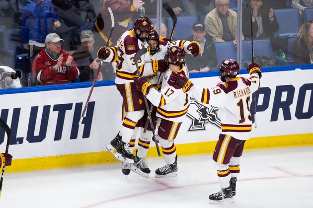 BUFFALO, NY - APRIL 13: Mikey Anderson #24 of the Minnesota Duluth Bulldogs celebrates his goal against the Massachusetts Minutemen with teammates Parker Mackay #39, Cole Koepke #17, and Justin Richards #19 during the 2019 NCAA Division I Men's Hockey Frozen Four Championship final at the KeyBank Center on April 13, 2019 in Buffalo, New York. (Photo by Richard T Gagnon/Getty Images)