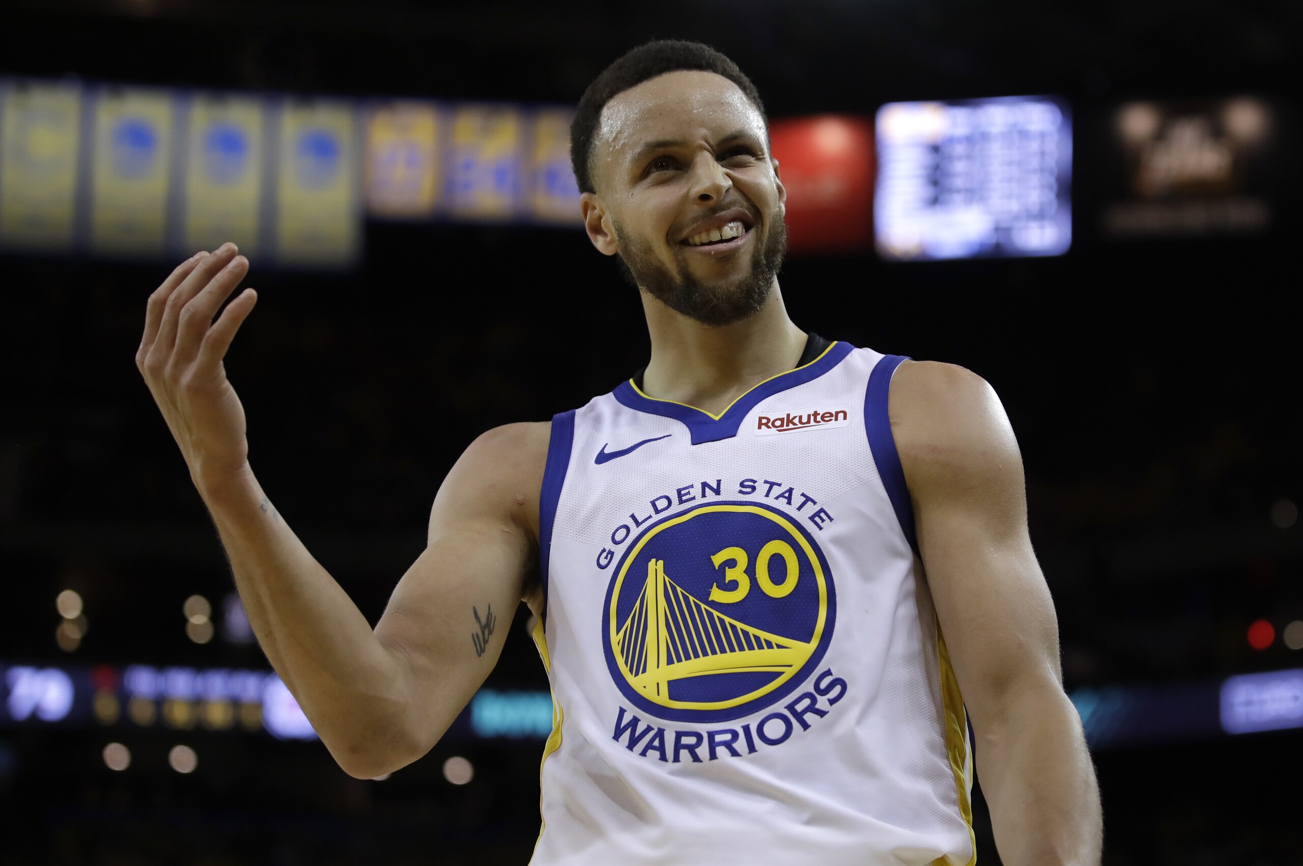 Golden State Warriors' Stephen Curry gestures to fans during the second half in Game 1 of a first-round NBA basketball playoff series against the Los Angeles Clippers, Saturday, April 13, 2019, in Oakland, Calif. (AP Photo/Ben Margot)