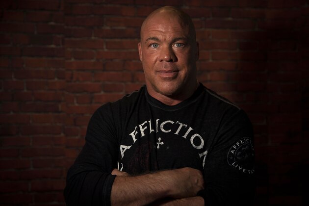 US wrestler and actor Kurt Angle poses on November 4, 2017, as he attends the 2017 Paris Games Week, at the Porte de Versailles exhibition centre in Paris. / AFP PHOTO / Thomas SAMSON        (Photo credit should read THOMAS SAMSON/AFP/Getty Images)