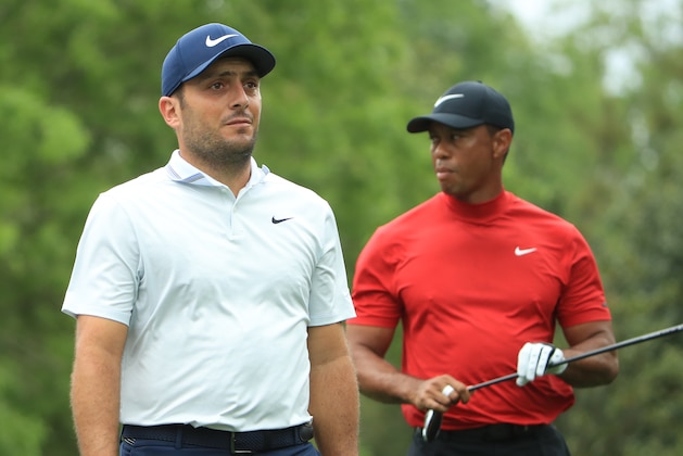 AUGUSTA, GEORGIA - APRIL 14: (L-R) Francesco Molinari of Italy and Tiger Woods of the United States walk off the fifth tee during the final round of the Masters at Augusta National Golf Club on April 14, 2019 in Augusta, Georgia. (Photo by Andrew Redington/Getty Images)