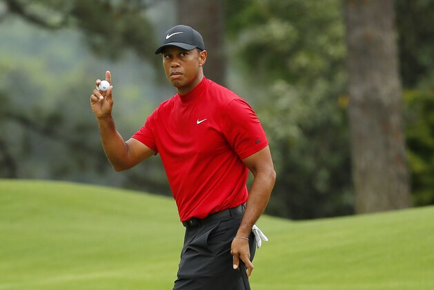 AUGUSTA, GEORGIA - APRIL 14: Tiger Woods of the United States waves on the eighth green during the final round of the Masters at Augusta National Golf Club on April 14, 2019 in Augusta, Georgia. (Photo by Kevin C. Cox/Getty Images)