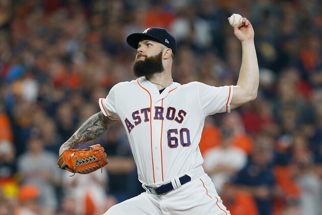 HOUSTON, TX - OCTOBER 16:  Dallas Keuchel #60 of the Houston Astros pitches in the first inning against the Boston Red Sox during Game Three of the American League Championship Series at Minute Maid Park on October 16, 2018 in Houston, Texas.  (Photo by Bob Levey/Getty Images)