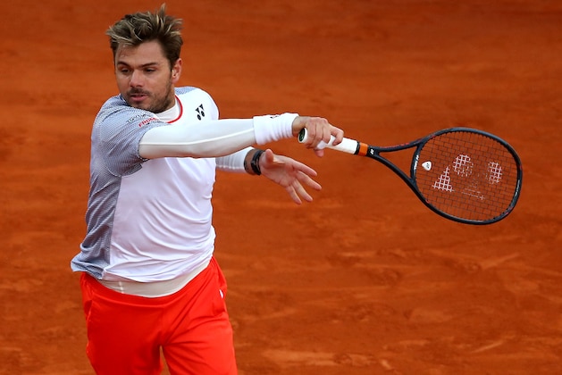 MONTE-CARLO, MONACO - APRIL 14: Stan Wawrinka of Switzerland plays a forehand against Lucas Pouille of France in their first round match during Day One of the Rolex Monte-Carlo Masters at Monte-Carlo Country Club on April 14, 2019 in Monte-Carlo, Monaco. (Photo by Clive Brunskill/Getty Images)
