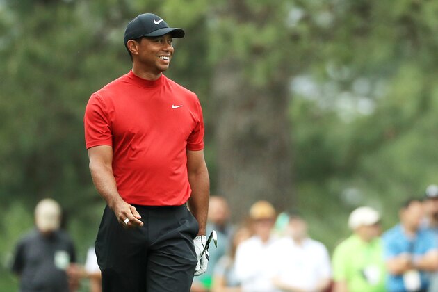 AUGUSTA, GEORGIA - APRIL 14: Tiger Woods of the United States reacts on the ninth hole during the final round of the Masters at Augusta National Golf Club on April 14, 2019 in Augusta, Georgia. (Photo by Mike Ehrmann/Getty Images)