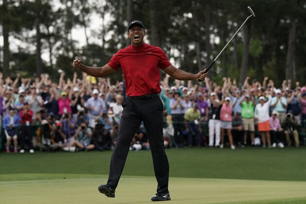 Tiger Woods reacts as he wins the Masters golf tournament Sunday, April 14, 2019, in Augusta, Ga. (AP Photo/David J. Phillip)