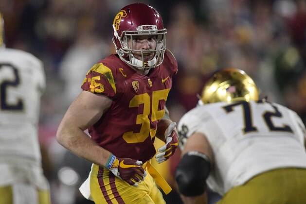 Southern California linebacker Cameron Smith gets set to run a play against Notre Dame offensive lineman Robert Hainsey during the second half of an NCAA college football game Saturday, Nov. 24, 2018, in Los Angeles. Notre Dame won 24-17. (AP Photo/Mark J. Terrill)