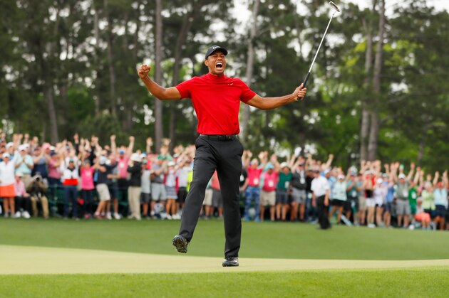 AUGUSTA, GEORGIA - APRIL 14: (Sequence frame 4 of 12) Tiger Woods of the United States celebrates after making his putt on the 18th green to win the Masters at Augusta National Golf Club on April 14, 2019 in Augusta, Georgia. (Photo by Kevin C. Cox/Getty Images)