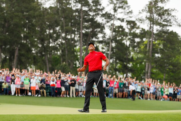AUGUSTA, GEORGIA - APRIL 14: (Sequence frame 10 of 12) Tiger Woods of the United States celebrates after making his putt on the 18th green to win the Masters at Augusta National Golf Club on April 14, 2019 in Augusta, Georgia. (Photo by Kevin C. Cox/Getty Images)