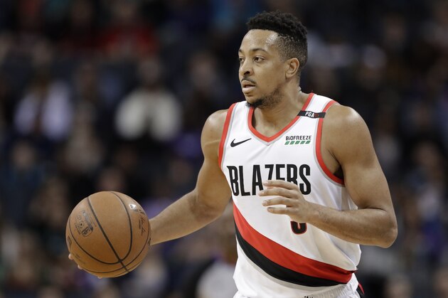 Portland Trail Blazers' CJ McCollum (3) brings the ball up court against the Charlotte Hornets during the first half of an NBA basketball game in Charlotte, N.C., Sunday, March 3, 2019. (AP Photo/Chuck Burton)