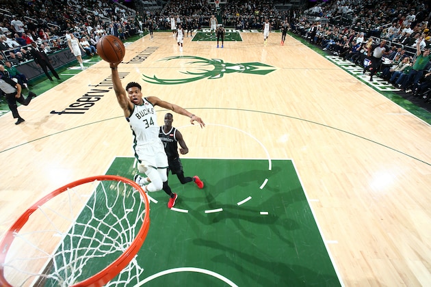 MILWAUKEE, WI - APRIL 14: Giannis Antetokounmpo #34 of the Milwaukee Bucks shoots the ball against the Detroit Pistons during Game One of Round One of the 2019 NBA Playoffs on April 14, 2019 at Fiserv Forum in Milwaukee, Wisconsin.  NOTE TO USER: User expressly acknowledges and agrees that, by downloading and or using this photograph, User is consenting to the terms and conditions of the Getty Images License Agreement. Mandatory Copyright Notice: Copyright 2019 NBAE  (Photo by Nathaniel S. Butler/NBAE via Getty Images)
