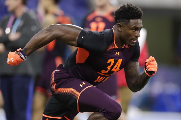 Mississippi wide receiver D.K. Metcalf runs a drill at the NFL football scouting combine in Indianapolis, Saturday, March 2, 2019. (AP Photo/Michael Conroy)