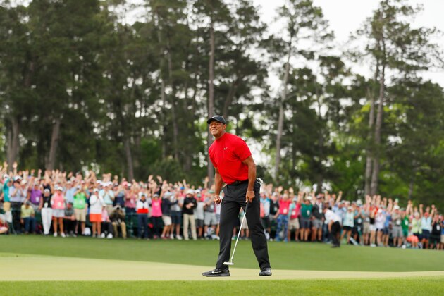 AUGUSTA, GEORGIA - APRIL 14: (Sequence frame 12 of 12) Tiger Woods of the United States celebrates after making his putt on the 18th green to win the Masters at Augusta National Golf Club on April 14, 2019 in Augusta, Georgia. (Photo by Kevin C. Cox/Getty Images)