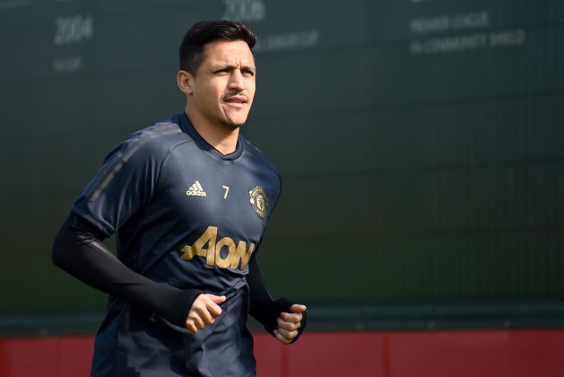 MANCHESTER, ENGLAND - APRIL 09: Alexis Sanchez of Manchester United walks off after the Manchester United training session ahead of the UEFA Champions League Quarter Final First Leg match between Manchester United v FC Barcelona at Aon Training Complex on April 09, 2019 in Manchester, England. (Photo by Nathan Stirk/Getty Images)