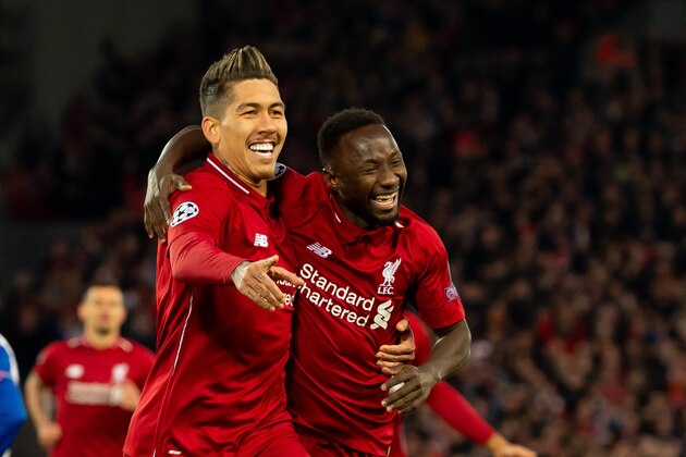 LIVERPOOL, ENGLAND - APRIL 09: Naby Keita of Liverpool celebrates after scoring his team's first goal with Roberto Firmino of Liverpool during the UEFA Champions League Quarter Final first leg match between Liverpool and Porto at Anfield on April 09, 2019 in Liverpool, England. (Photo by TF-Images/Getty Images)