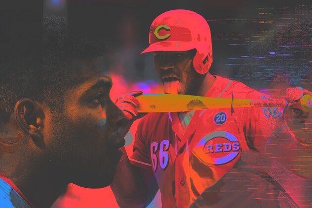 Cincinnati Reds Yasiel Puig poses for a photograph with young athletes during a media availability at the P&G MLB Cincinnati Reds Youth Academy, Wednesday, Jan. 30, 2019, in Cincinnati. (AP Photo/John Minchillo)