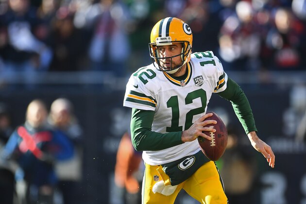 CHICAGO, ILLINOIS - DECEMBER 16:  Aaron Rodgers #12 of the Green Bay Packers looks to pass during a game against the Chicago Bears at Soldier Field on December 16, 2018 in Chicago, Illinois. The Bears defeated the Packers 24-17.  (Photo by Stacy Revere/Getty Images)