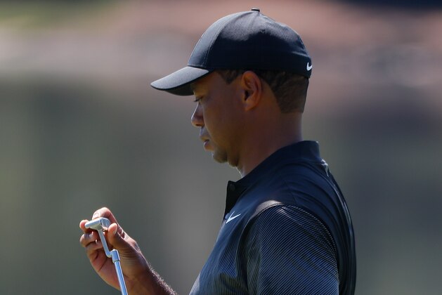 ATLANTA, GA - SEPTEMBER 19:  Tiger Woods warms up on the putting green during practice for the Tour Championship at East Lake Golf Club on September 19, 2018 in Atlanta, Georgia.  (Photo by Kevin C. Cox/Getty Images)