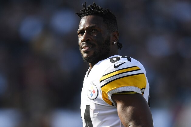 OAKLAND, CA - DECEMBER 09:  Antonio Brown #84 of the Pittsburgh Steelers looks on as he walks onto the field against the Oakland Raiders during the first half of their NFL football game at Oakland-Alameda County Coliseum on December 9, 2018 in Oakland, California.  (Photo by Thearon W. Henderson/Getty Images)