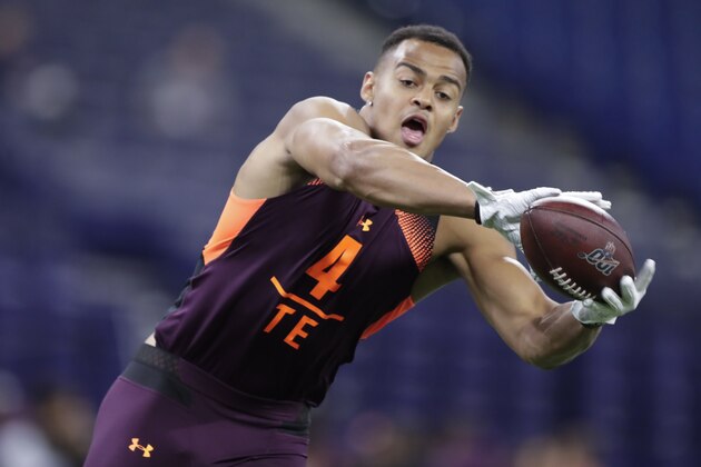 Iowa tight end Noah Fant runs a drill at the NFL football scouting combine in Indianapolis, Saturday, March 2, 2019. (AP Photo/Michael Conroy)