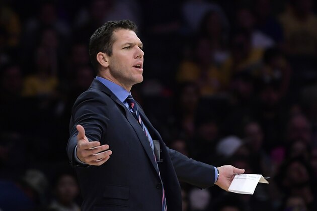 Los Angeles Lakers coach Luke Walton gestures during the second half of the team's NBA basketball game against the Portland Trail Blazers on Tuesday, April 9, 2019, in Los Angeles. The Trail Blazers won 104-101. (AP Photo/Mark J. Terrill)