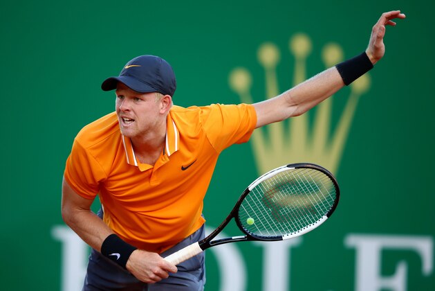 MONTE-CARLO, MONACO - APRIL 15:  Kyle Edmund of Great Britain serves against Diego Schwartzman of Argentina in their first round match during day two of the Rolex Monte-Carlo Masters at Monte-Carlo Country Club on April 15, 2019 in Monte-Carlo, Monaco. (Photo by Clive Brunskill/Getty Images)