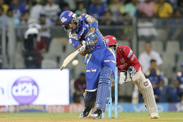 Mumbai Indians player Hardik Pandya plays a shot during their Indian Premier League (IPL) cricket match against Kings XI Punjab in Mumbai, India, Thursday, May 11, 2017. (AP Photo/Rajanish Kakade)