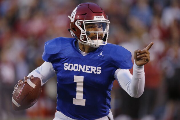Oklahoma quarterback Jalen Hurts (1) gestures during an NCAA college football intra-squad spring game in Norman, Okla., Friday, April 12, 2019. (AP Photo/Sue Ogrocki)