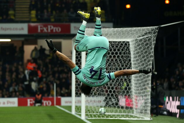 WATFORD, ENGLAND - APRIL 15:  Pierre-Emerick Aubameyang of Arsenal celebrates scoring his side's first goal during the Premier League match between Watford FC and Arsenal FC at Vicarage Road on April 15, 2019 in Watford, United Kingdom. (Photo by Marc Atkins/Getty Images)