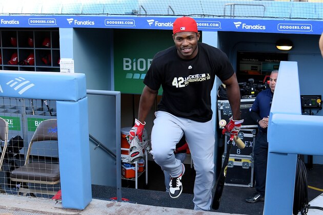 LOS ANGELES, CALIFORNIA - APRIL 15:  Former Los Angeles Dodger Yasiel Puig #66, now of the Cincinnati Reds, steps out of the dugout during batting practice before the game on Jackie Robinson Day at Dodger Stadium on April 15, 2019 in Los Angeles, California. (Photo by Harry How/Getty Images)