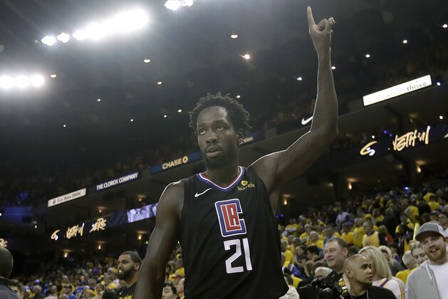 Los Angeles Clippers guard Patrick Beverley celebrates during the second half of Game 2 of a first-round NBA basketball playoff series against the Golden State Warriors in Oakland, Calif., Monday, April 15, 2019. (AP Photo/Jeff Chiu)