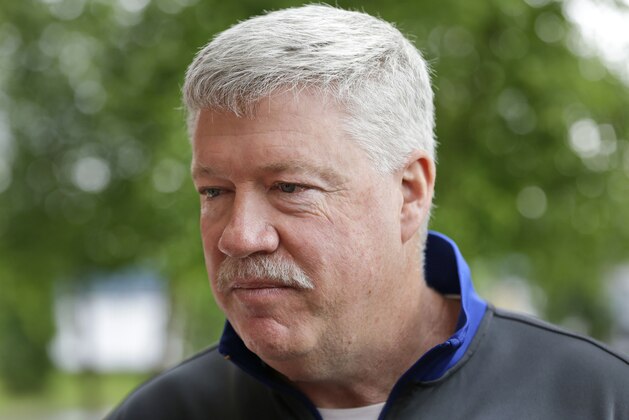 New York Giants offensive coordinator Kevin Gilbride speaks to the media after a Giants minicamp in East Rutherford, N.J., Thursday, June 13, 2013.   (AP Photo/Seth Wenig)
