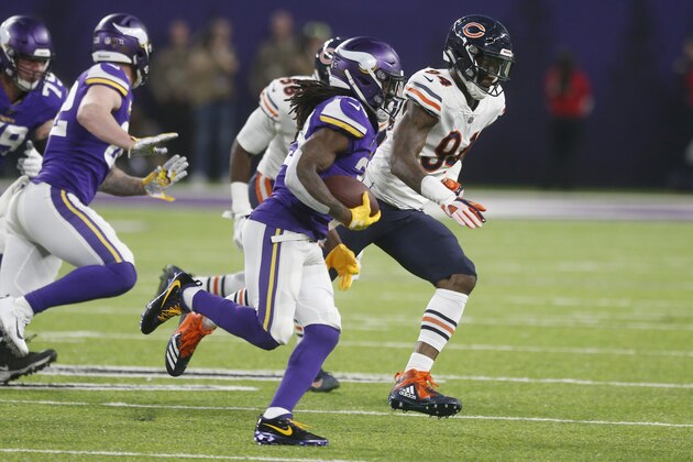 Minnesota Vikings running back Dalvin Cook carries the ball during the first half of an NFL football game against the Chicago Bears, Sunday, Dec. 30, 2018, in Minneapolis. (AP Photo/Jim Mone)