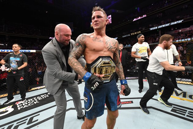 ATLANTA, GA - APRIL 13:  (L-R) UFC President Dana White places the interim lightweight championship belt on Dustin Poirier after defeating Max Holloway in their interim lightweight championship bout during the UFC 236 event at State Farm Arena on April 13, 2019 in Atlanta, Georgia. (Photo by Josh Hedges/Zuffa LLC/Zuffa LLC via Getty Images)