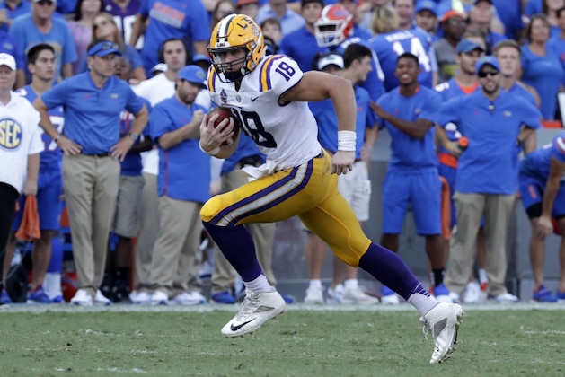 LSU tight end Foster Moreau runs against Florida after a reception during the second half of an NCAA college football game, Saturday, Oct. 6, 2018, in Gainesville, Fla. (AP Photo/John Raoux)