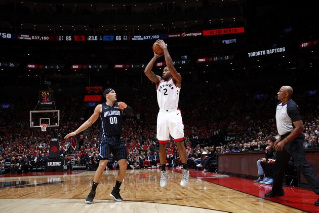 TORONTO, CANADA - APRIL 16: Kawhi Leonard #2 of the Toronto Raptors shoots the ball against the Orlando Magic during Game Two of Round One of the 2019 NBA Playoffs on April 16, 2019 at the Scotiabank Arena in Toronto, Ontario, Canada.  NOTE TO USER: User expressly acknowledges and agrees that, by downloading and or using this Photograph, user is consenting to the terms and conditions of the Getty Images License Agreement.  Mandatory Copyright Notice: Copyright 2019 NBAE (Photo by Mark Blinch/NBAE via Getty Images)