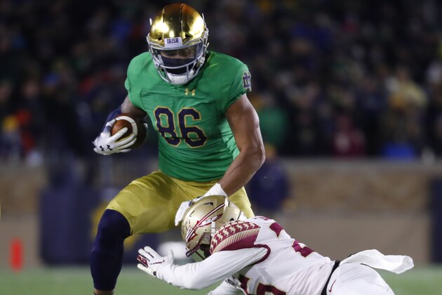 Notre Dame tight end Alize Mack (86) tries to avoid Florida State defensive back Asante Samuel Jr. (26) after a catch in the second half of an NCAA college football game in South Bend, Ind., Saturday, Nov. 10, 2018. (AP Photo/Paul Sancya)