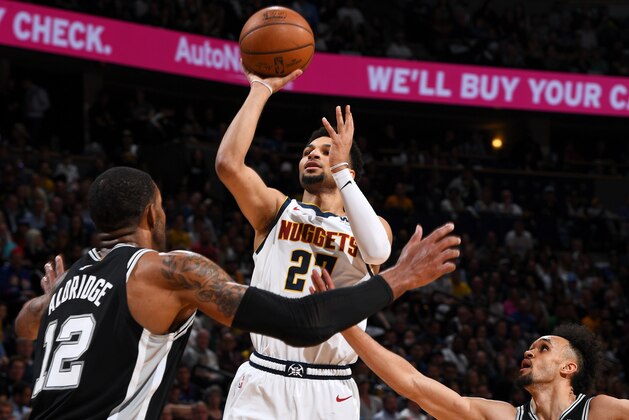DENVER, CO - APRIL 16:  Jamal Murray #27 of the Denver Nuggets shoots the ball against the San Antonio Spurs during Game Two of Round One of the 2019 NBA Playoffs on on April 16, 2019 at the Pepsi Center in Denver, Colorado. NOTE TO USER: User expressly acknowledges and agrees that, by downloading and/or using this Photograph, user is consenting to the terms and conditions of the Getty Images License Agreement. Mandatory Copyright Notice: Copyright 2019 NBAE (Photo by Garrett Ellwood/NBAE via Getty Images)