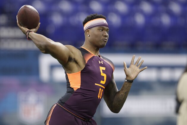 Ohio State quarterback Dwayne Haskins runs a drill during the NFL football scouting combine, Saturday, March 2, 2019, in Indianapolis. (AP Photo/Darron Cummings)