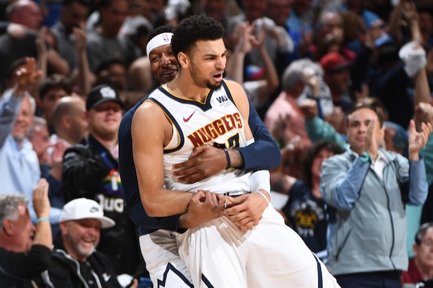 DENVER, CO - APRIL 16:  Jamal Murray #27 of the Denver Nuggets reacts to a play during Game Two of Round One of the 2019 NBA Playoffs on on April 16, 2019 at the Pepsi Center in Denver, Colorado. NOTE TO USER: User expressly acknowledges and agrees that, by downloading and/or using this Photograph, user is consenting to the terms and conditions of the Getty Images License Agreement. Mandatory Copyright Notice: Copyright 2019 NBAE (Photo by Garrett Ellwood/NBAE via Getty Images)