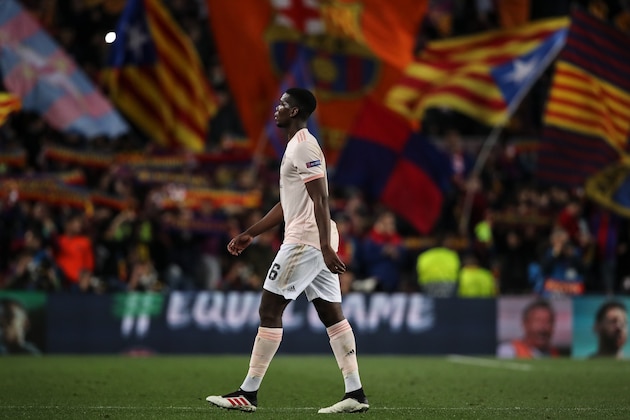 BARCELONA, SPAIN - APRIL 16: A dejected Paul Pogba of Manchester United at full time during the UEFA Champions League Quarter Final second leg match between FC Barcelona and Manchester United at Camp Nou on April 16, 2019 in Barcelona, Spain. (Photo by Matthew Ashton - AMA/Getty Images)