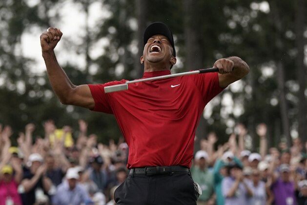 Tiger Woods reacts as he wins the Masters golf tournament Sunday, April 14, 2019, in Augusta, Ga. (AP Photo/David J. Phillip)