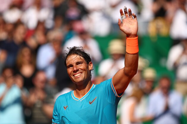 MONTE-CARLO, MONACO - APRIL 17: Rafael Nadal of Spain waves to the crowd after his straight set victory against Roberto Bautista Agut of Spain in their second round match during day four of the Rolex Monte-Carlo Masters at Monte-Carlo Country Club on April 17, 2019 in Monte-Carlo, Monaco. (Photo by Clive Brunskill/Getty Images)