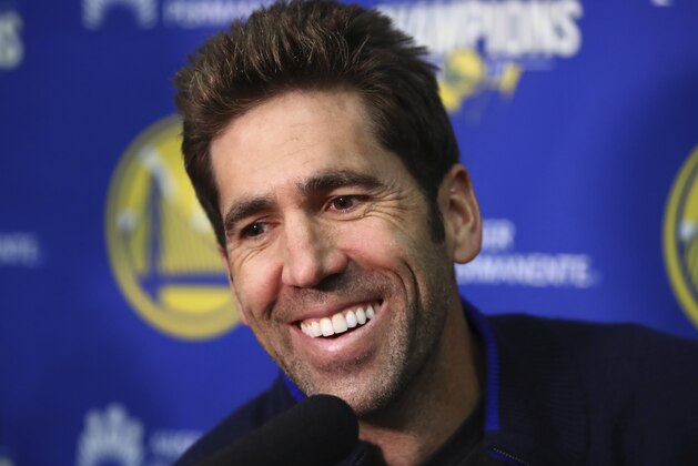Golden State Warriors General Manager Bob Myers smiles during a media conference Monday, June 11, 2018, in Oakland, Calif. (AP Photo/Ben Margot)
