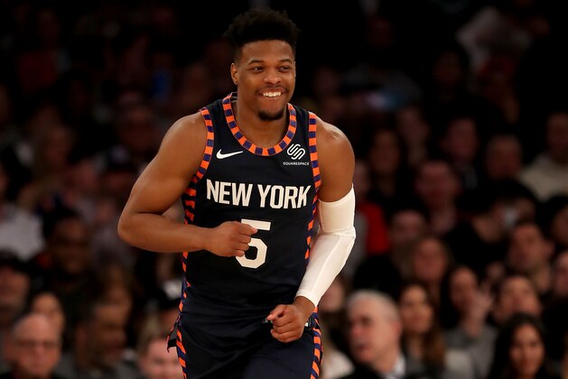 NEW YORK, NEW YORK - APRIL 07:  Dennis Smith Jr. #5 of the New York Knicks celebrates his shot in the first half against the Washington Wizards at Madison Square Garden on April 07, 2019 in New York City. NOTE TO USER: User expressly acknowledges and agrees that, by downloading and or using this photograph, User is consenting to the terms and conditions of the Getty Images License Agreement. (Photo by Elsa/Getty Images)