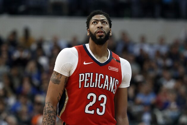 New Orleans Pelicans' Anthony Davis walks on the court during an NBA basketball game against the Dallas Mavericks in Dallas, Monday, March 18, 2019. (AP Photo/Tony Gutierrez)