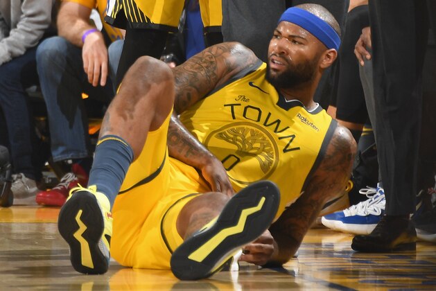 OAKLAND, CA - APRIL 15: DeMarcus Cousins #0 of the Golden State Warriors looks on during a game against the LA Clippers in Game Two of Round One during the 2019 NBA Playoffs on April 15, 2019 at ORACLE Arena in Oakland, California. NOTE TO USER: User expressly acknowledges and agrees that, by downloading and/or using this photograph, user is consenting to the terms and conditions of Getty Images License Agreement. Mandatory Copyright Notice: Copyright 2019 NBAE (Photo by Andrew D. Bernstein/NBAE via Getty Images)
