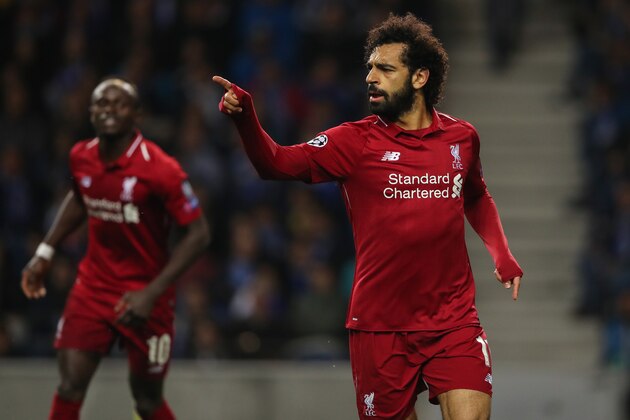 PORTO, PORTUGAL - APRIL 17: Mohamed Salah of Liverpool celebrates after scoring a goal to make it 0-2  during the UEFA Champions League Quarter Final second leg match between Porto and Liverpool at Estadio do Dragao on April 17, 2019 in Porto, Portugal. (Photo by Matthew Ashton - AMA/Getty Images)