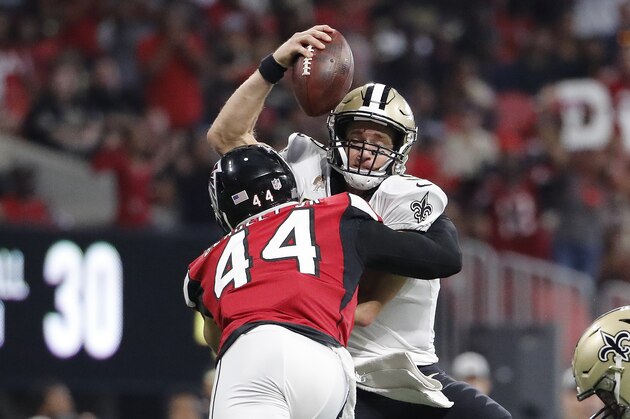 New Orleans Saints quarterback Drew Brees (9) is sacked by Atlanta Falcons linebacker Vic Beasley (44) during the second half of an NFL football game, Sunday, Sept. 23, 2018, in Atlanta. (AP Photo/David Goldman)