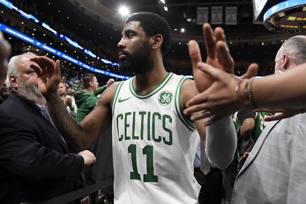 BOSTON, MA - APRIL 17: Kyrie Irving #11 of the Boston Celtics exits the court after Game Two of Round One of the 2019 NBA Playoffs against the Boston Celtics on April 17, 2019 at the TD Garden in Boston, Massachusetts.  NOTE TO USER: User expressly acknowledges and agrees that, by downloading and or using this photograph, User is consenting to the terms and conditions of the Getty Images License Agreement. Mandatory Copyright Notice: Copyright 2019 NBAE  (Photo by Brian Babineau/NBAE via Getty Images)